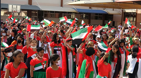 childs-with-uae-flags